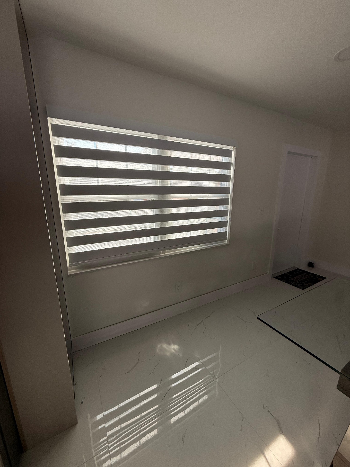 Motorized smart blinds in luxury bedroom